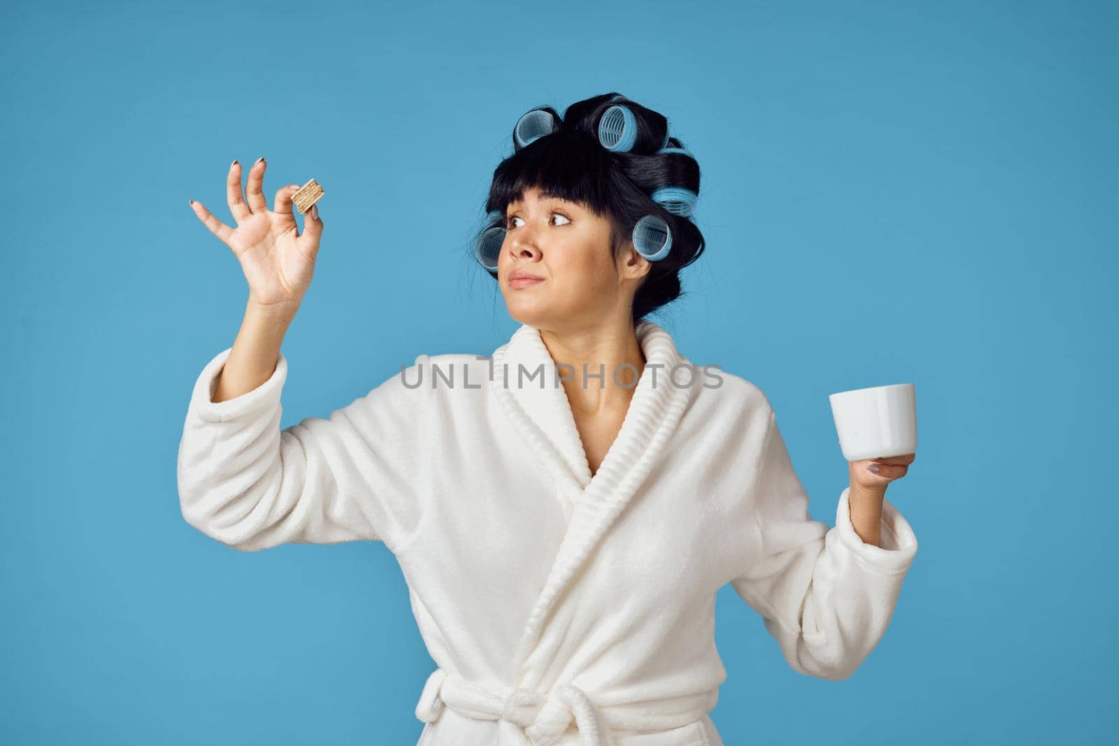 Woman in white robe housework cleaning service blue background Royalty ...