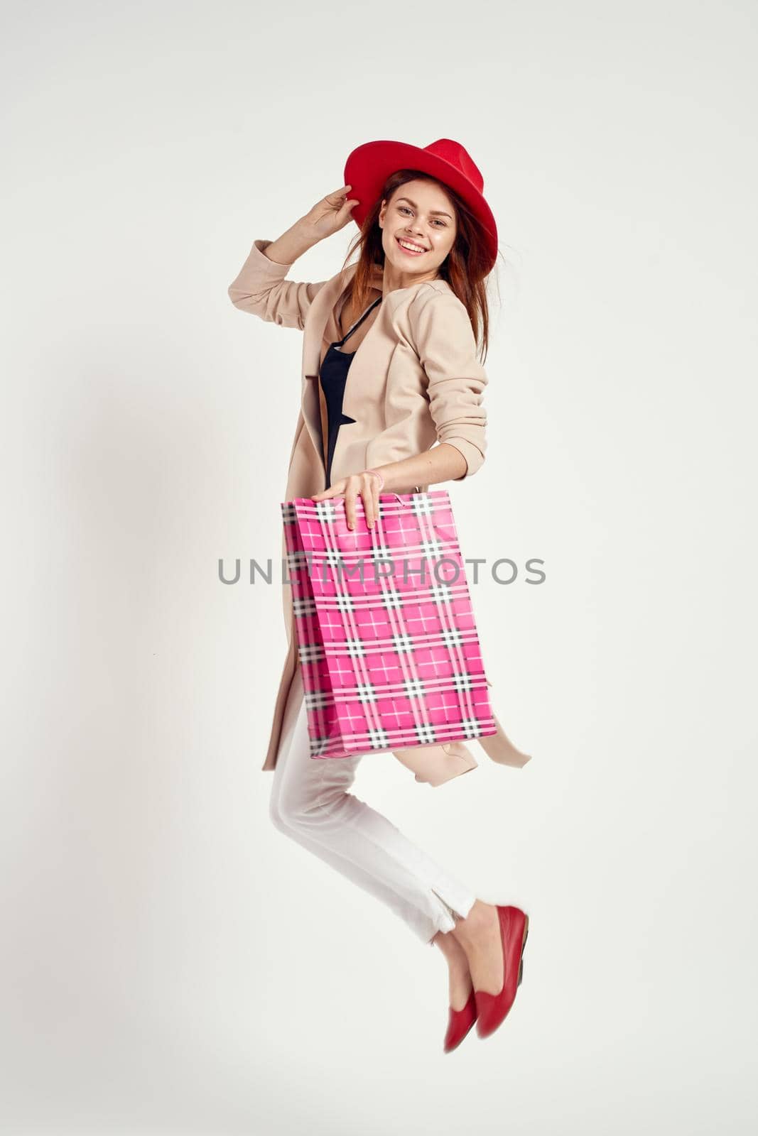 cheerful woman attractive look shopping smile studio model. High quality photo