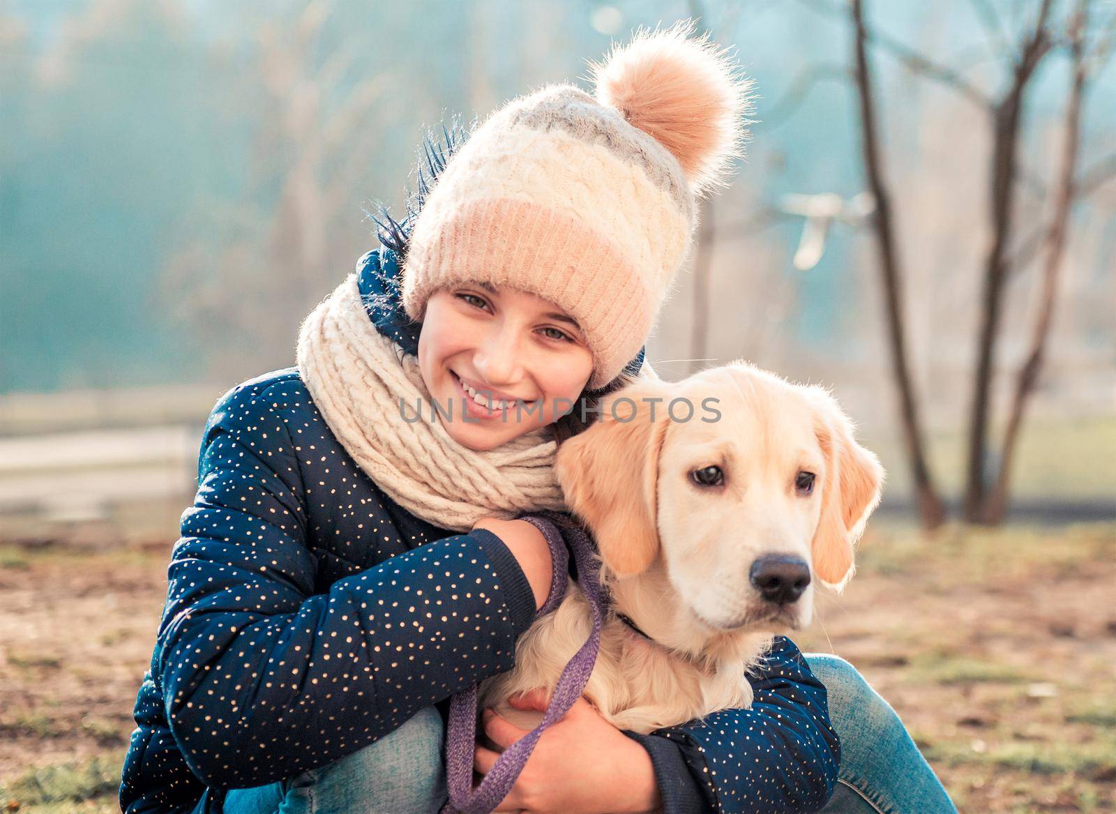 Beautiful girl hugging dog by tan4ikk1