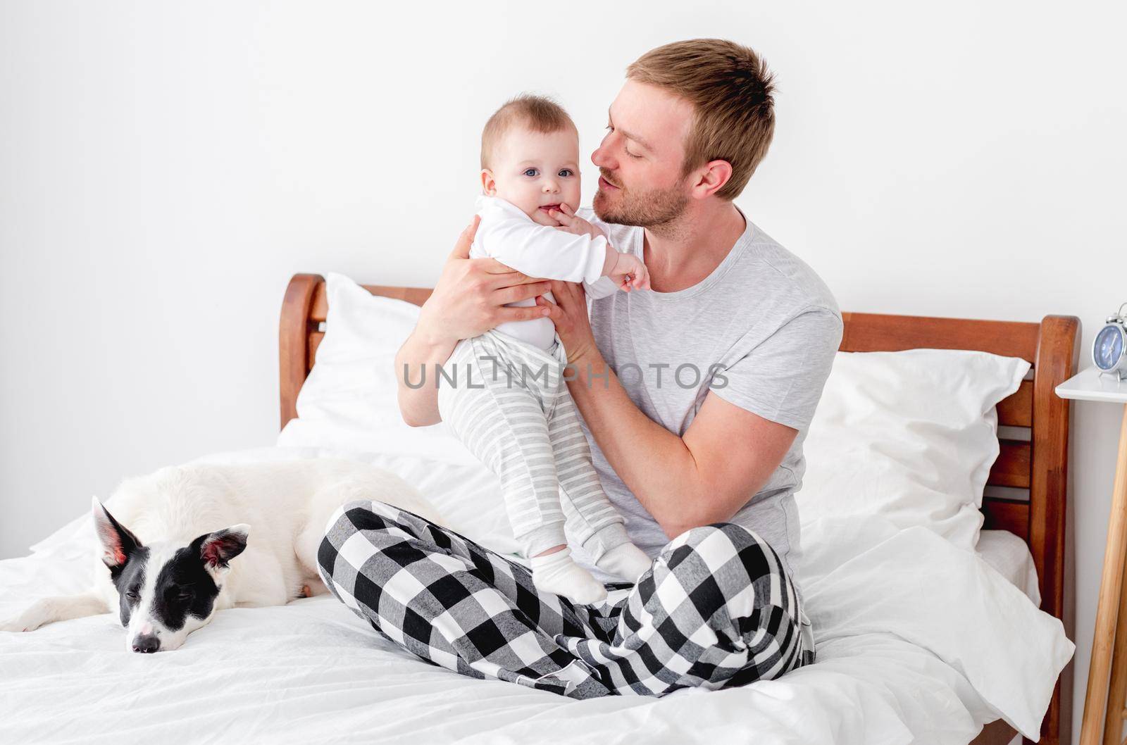 Father with son in the bed by tan4ikk1