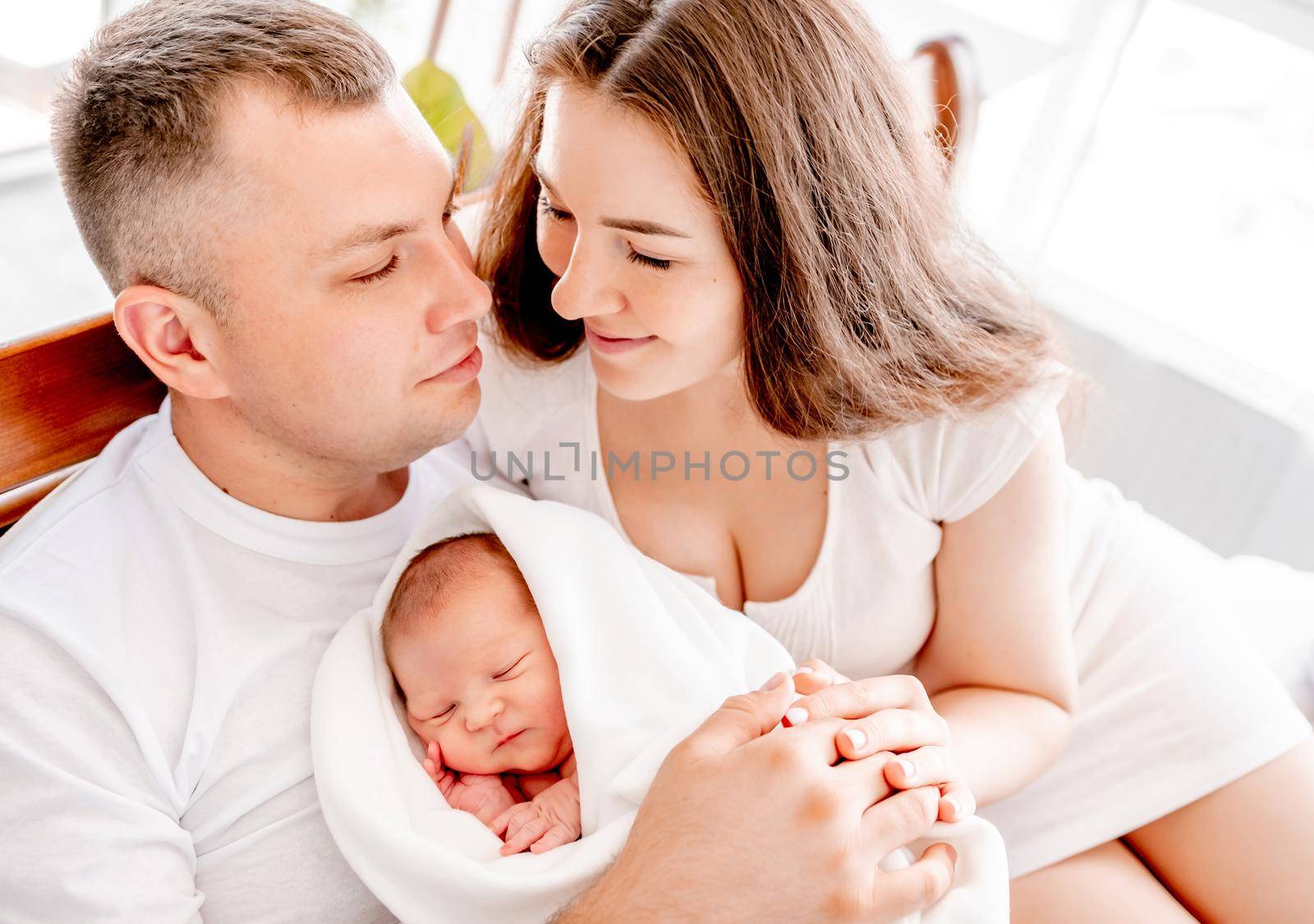Young family with newborn daughter by tan4ikk1