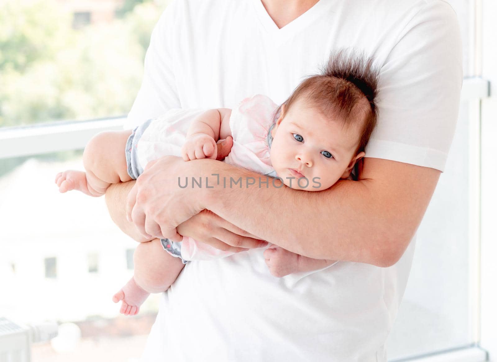 Baby protected by father's hands by tan4ikk1