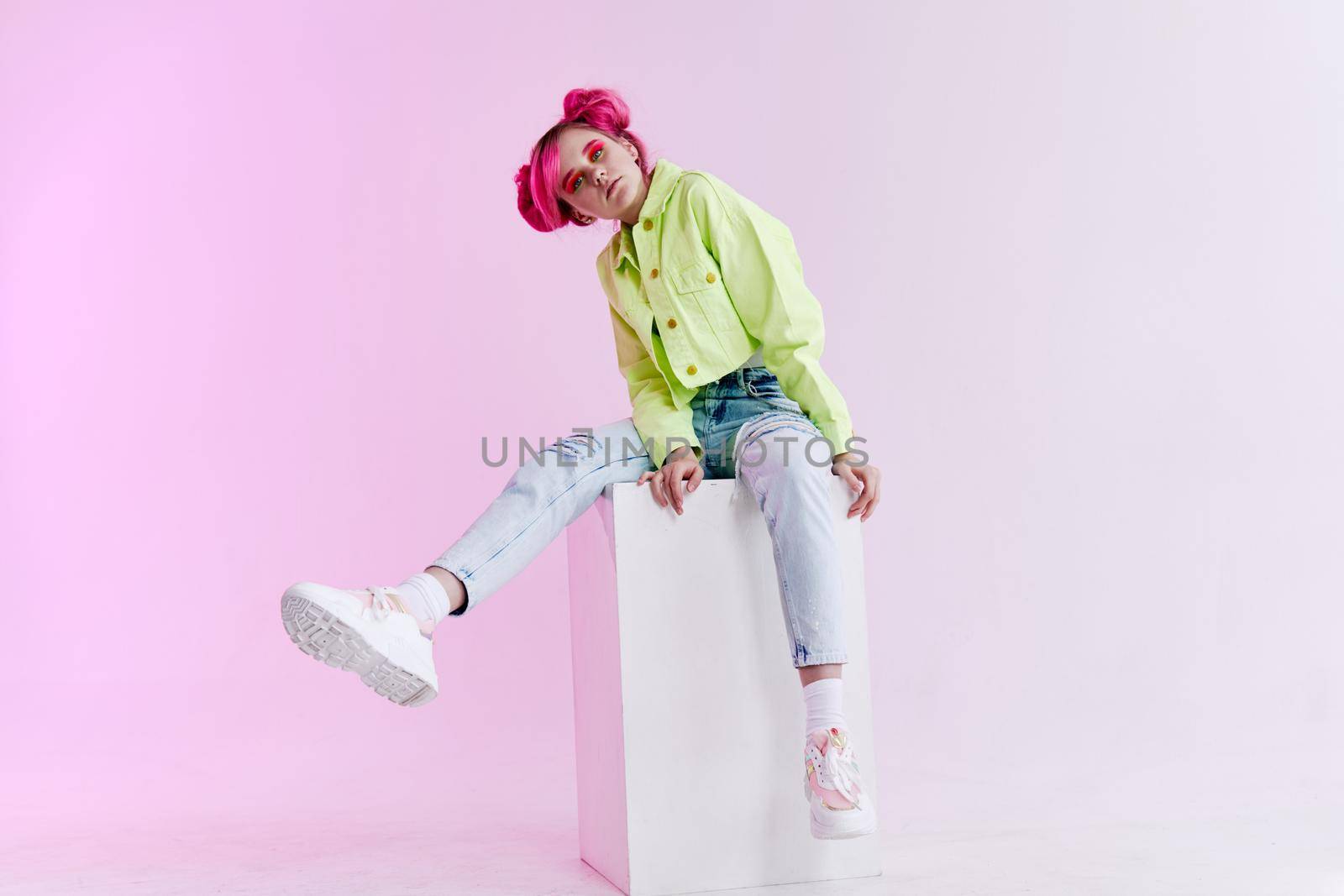 girl with pink hair teen posing fashion neon. High quality photo