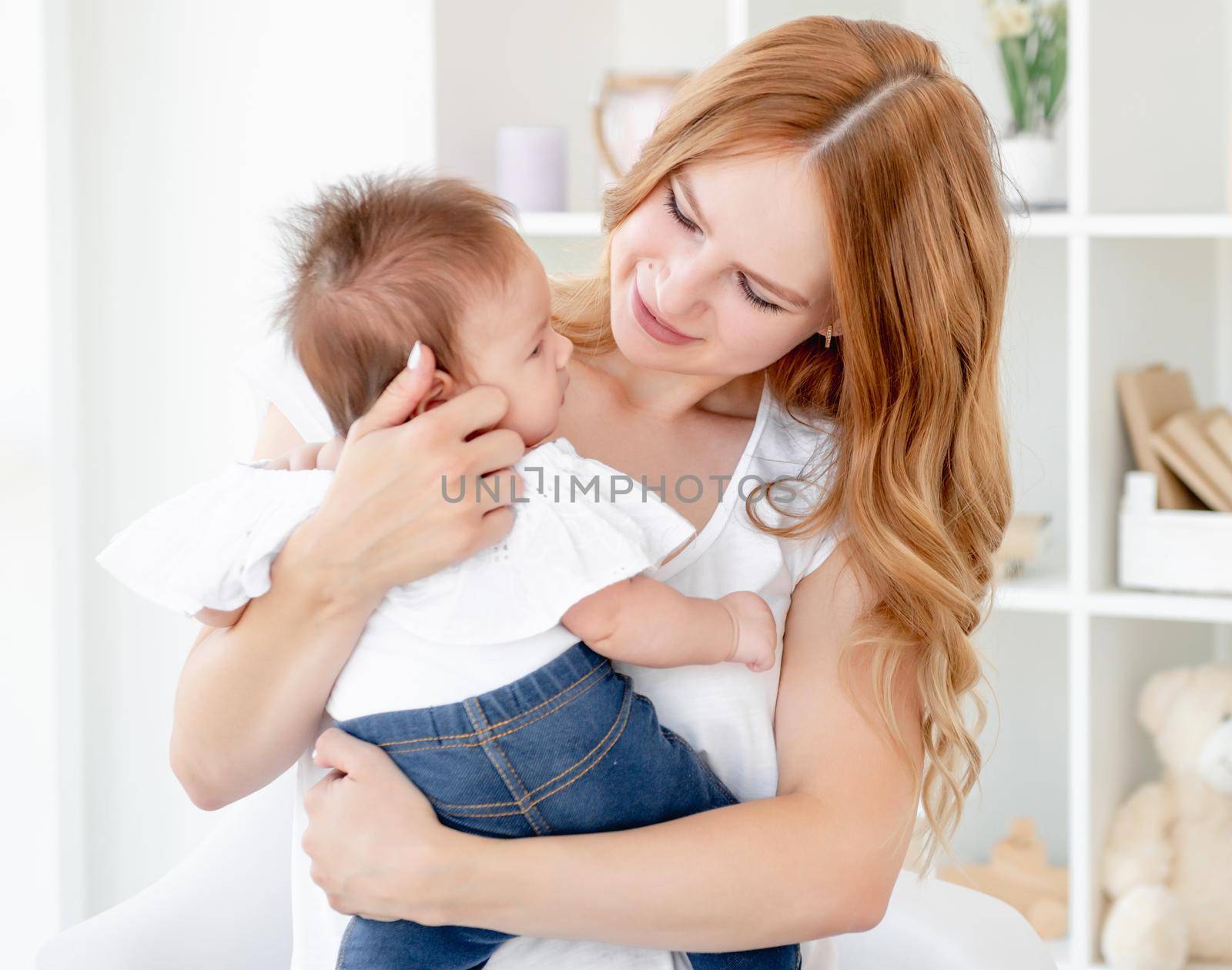 Mother hugging baby by tan4ikk1