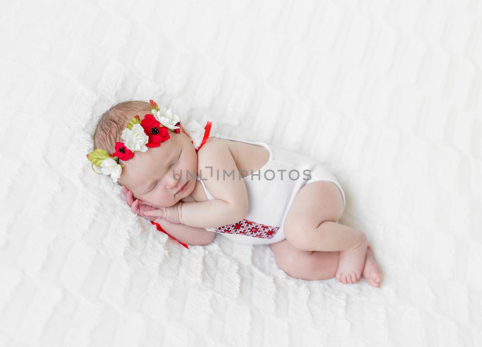 baby girl in bright colorful hairband by tan4ikk1