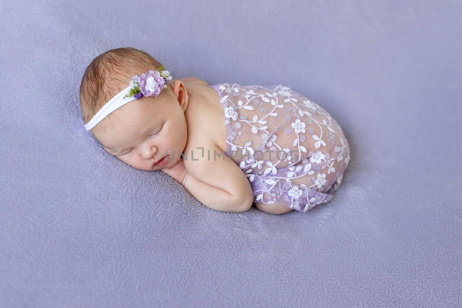 Cute infant sleeping covered with purple veil by tan4ikk1