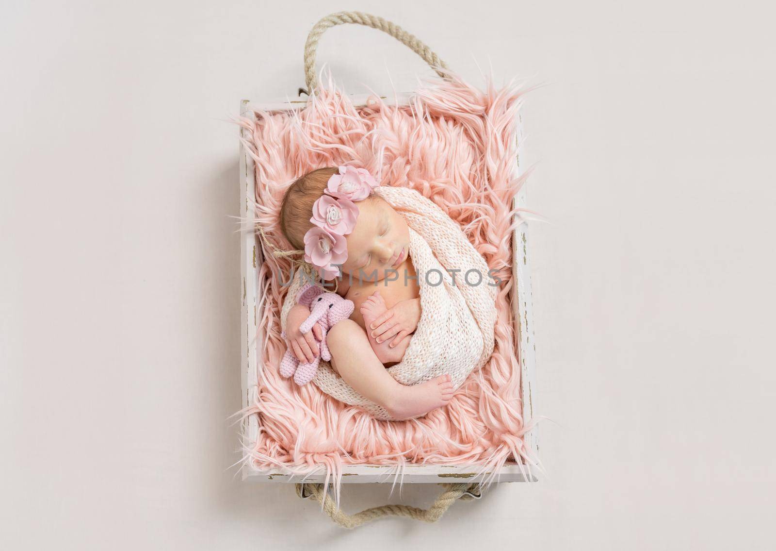 Baby girl on soft pink blanket, topview by tan4ikk1
