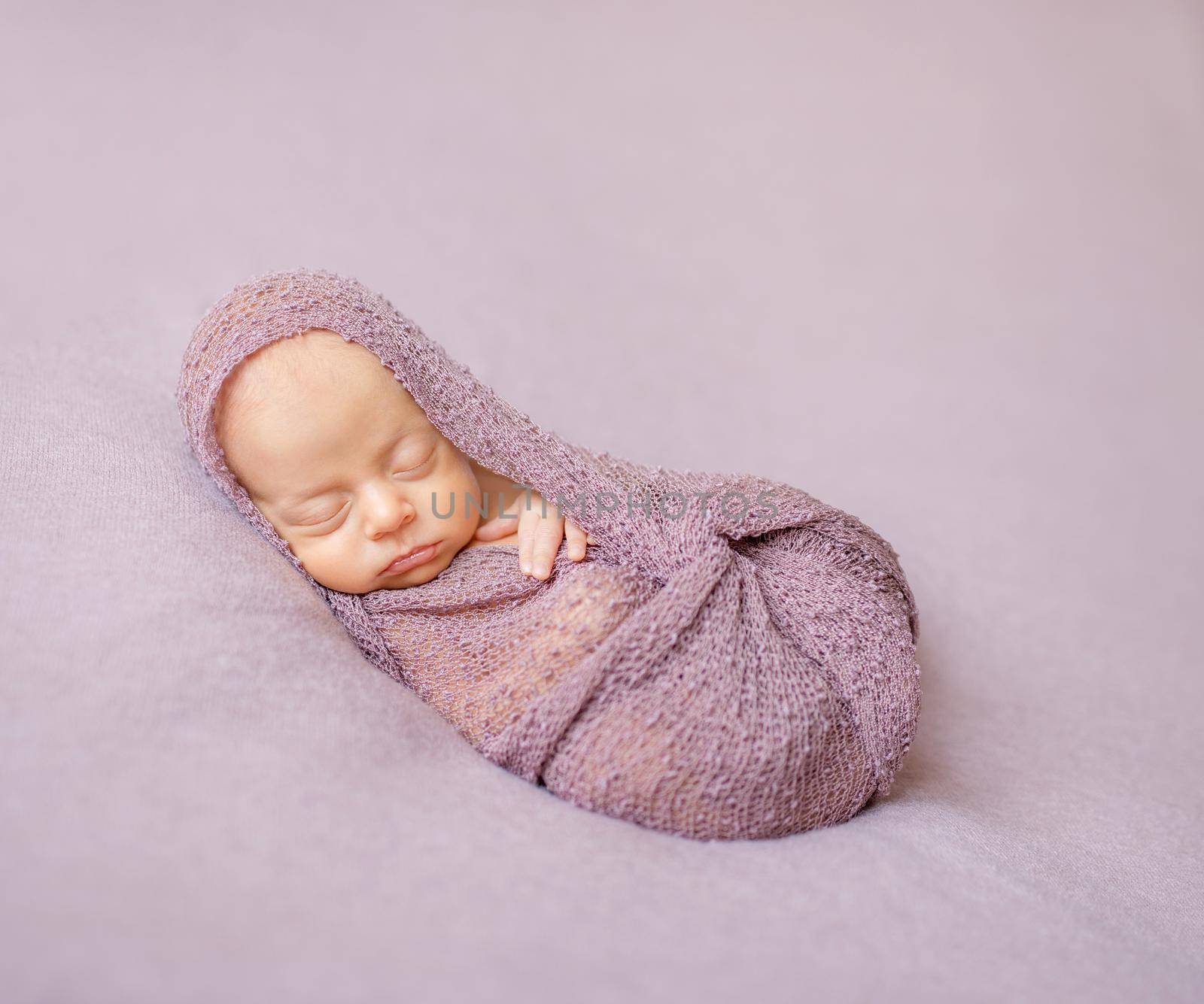 lovely newborn swaddled in pink diaper by tan4ikk1