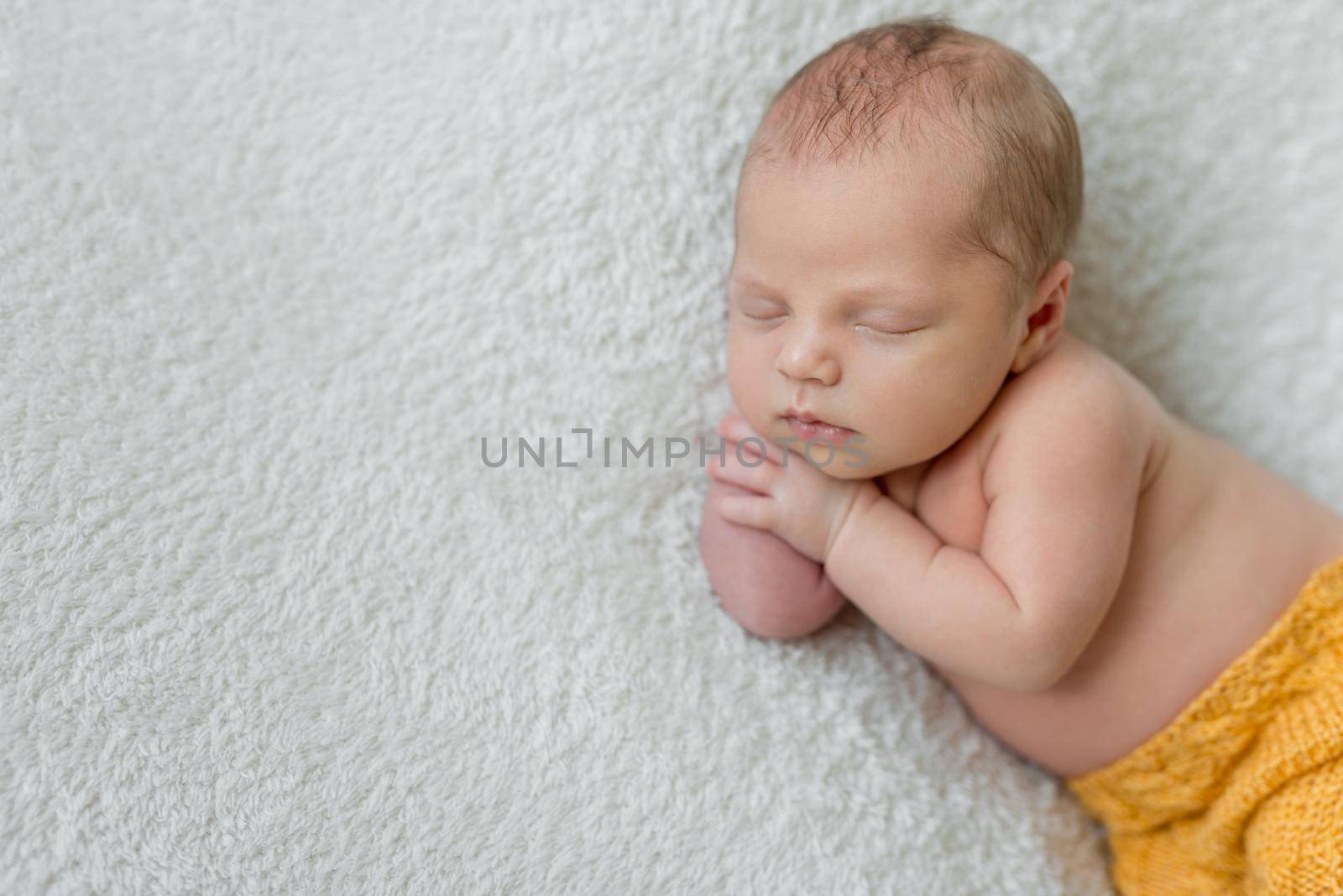 sweet sleeping newborn boy in yellow panties by tan4ikk1