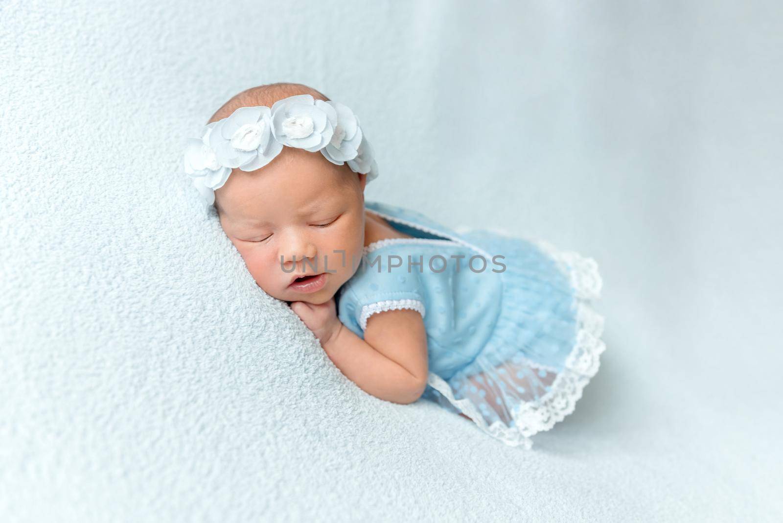 Cute sleeping newborn baby girl