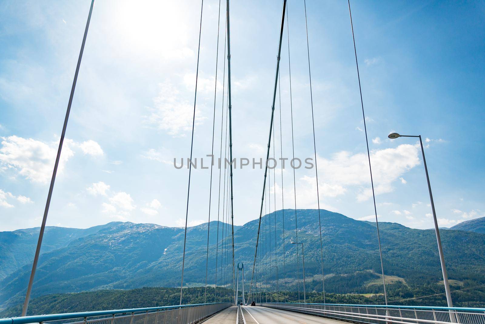 Hardanger Bridge. Hardangerbrua connecting two sides of Hardangerfjorden. Norway Hardangerfjord Hardanger bridge. newly built Hardangerbrua bridge close to Ulvik in Western Norway by Tomashevska