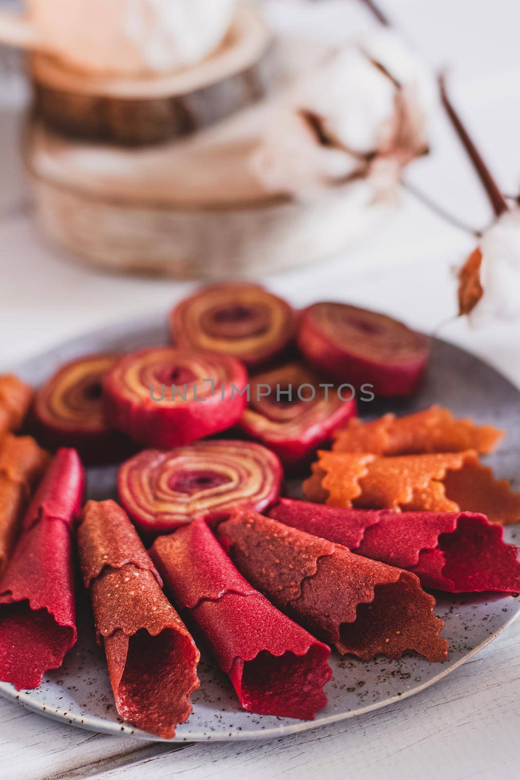 Fruit rolls pastille. Apple candy rolls, chips. Shredded and dried fruits. Useful sweetness. Food dessert. Homemade snack. Degidrated fruits. Natural and healthy, Sugar-Free, nutrition.