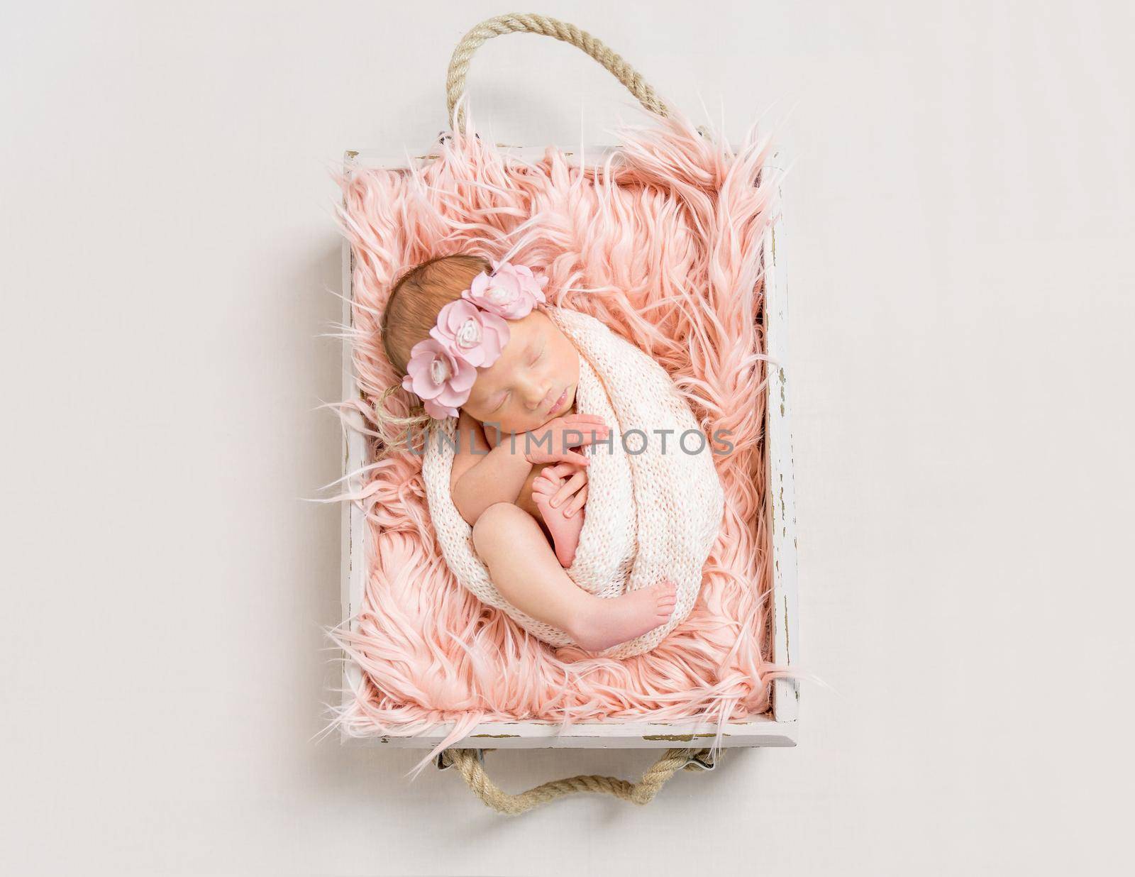 Baby girl on soft pink blanket, topview by tan4ikk1