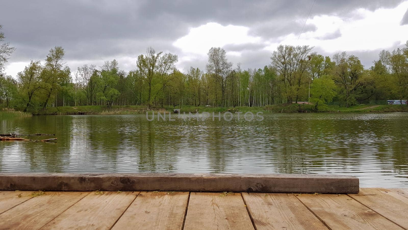 Reflection Natural Landscape View. Old wooden jetty, deck or pier in the lake. Nice looping background