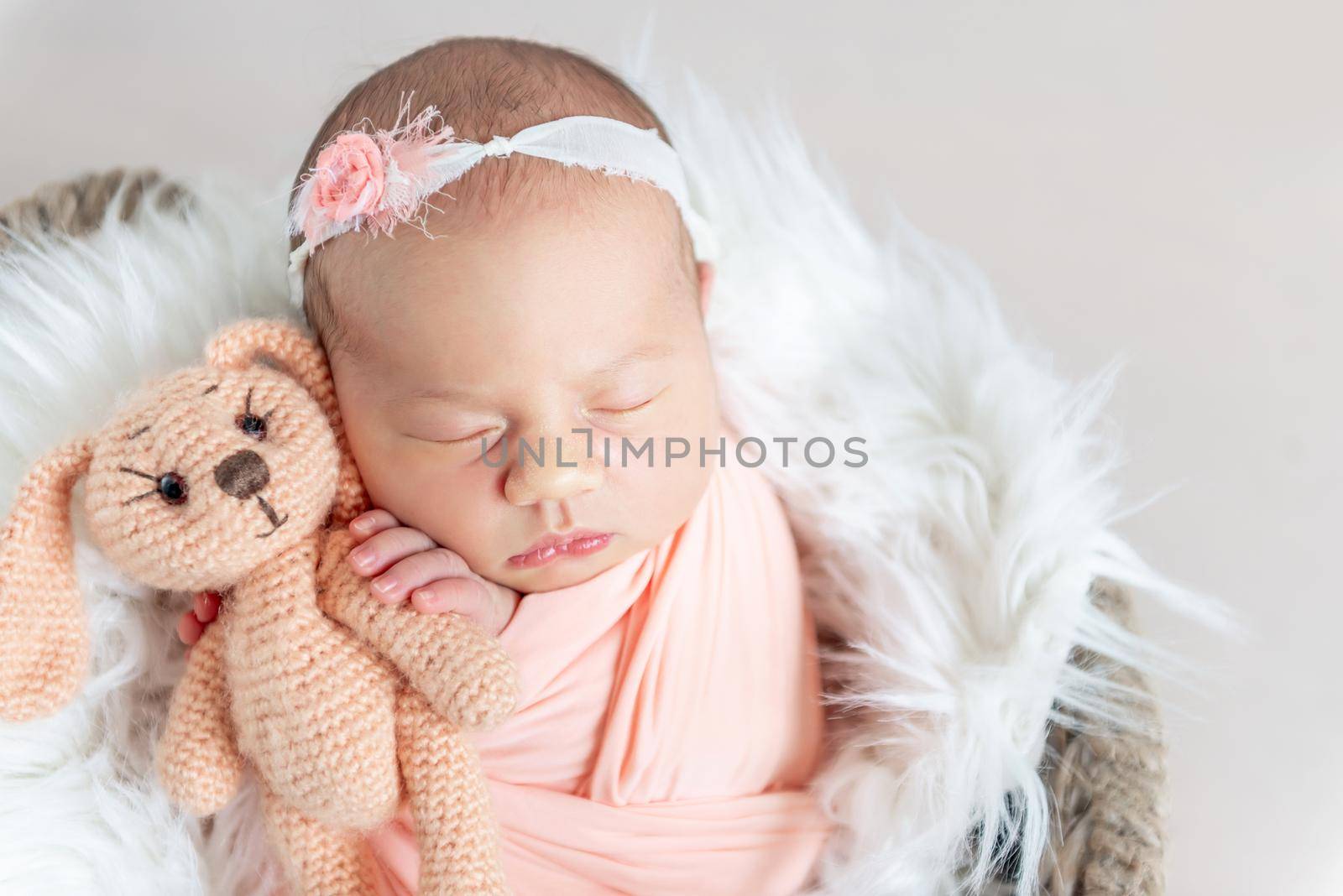 cute sleepy newborn baby girl