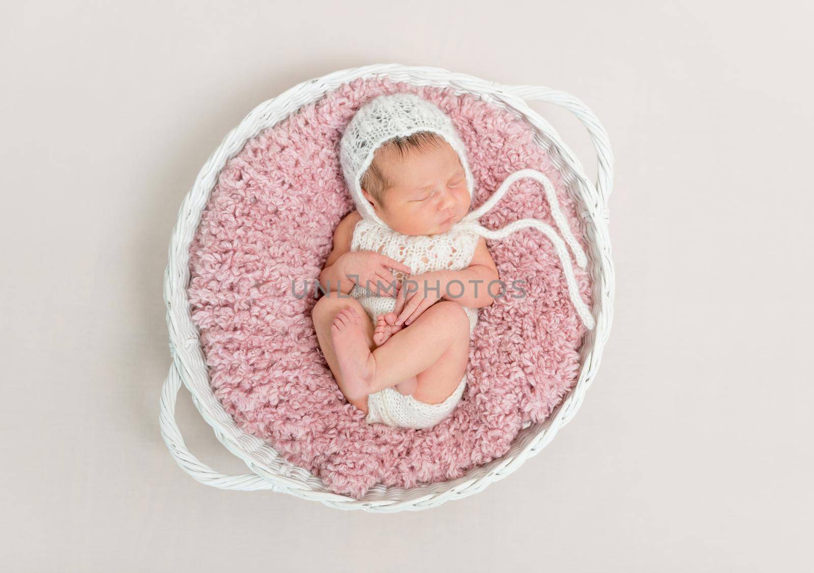 kid napping on big pink pillow by tan4ikk1