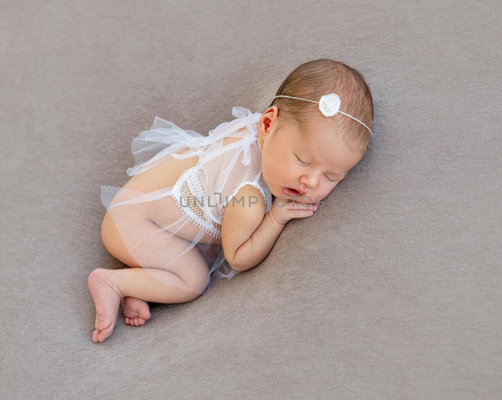 newborn baby girl sleeping sweetly