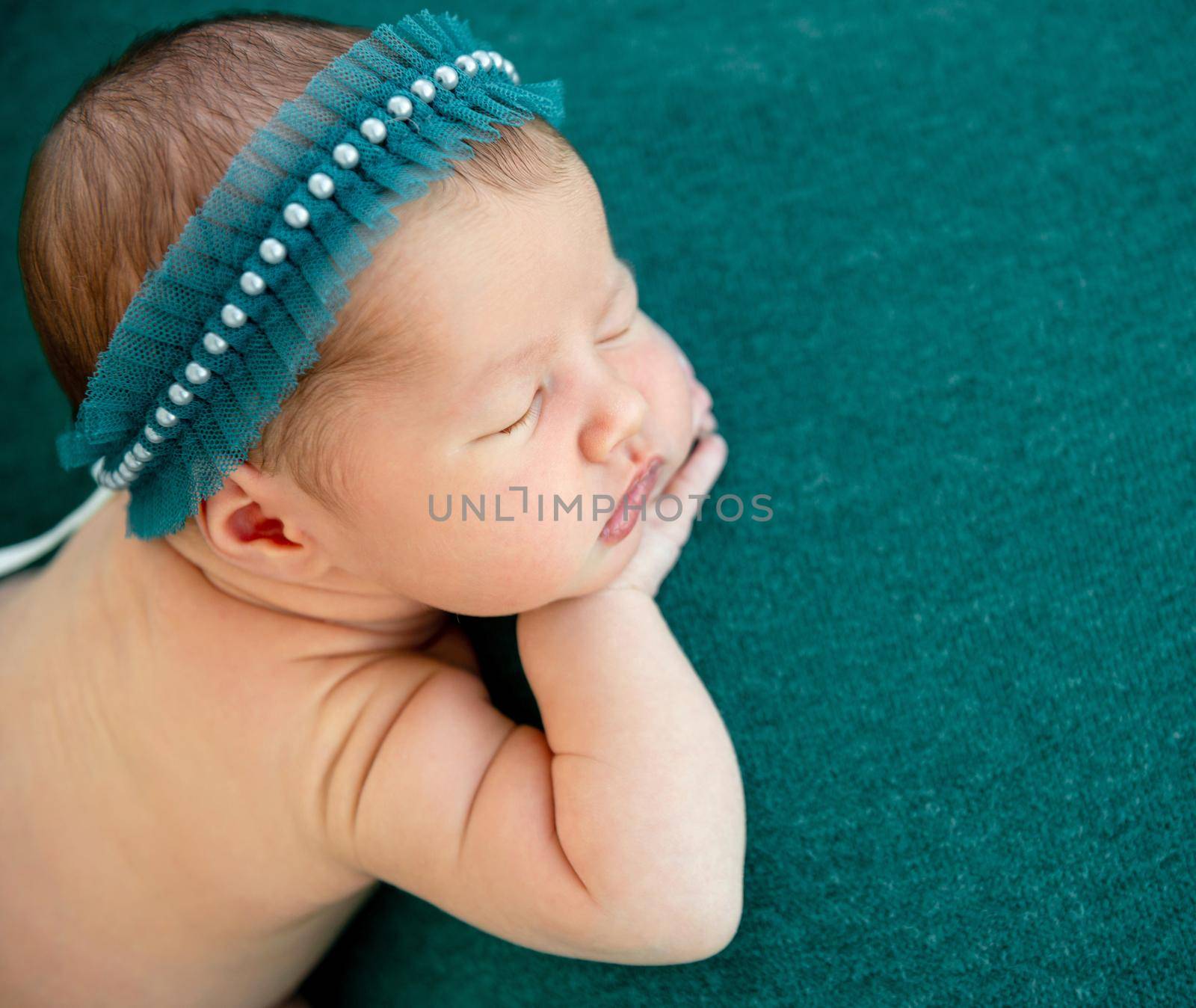 newborn baby girl sleeping sweetly