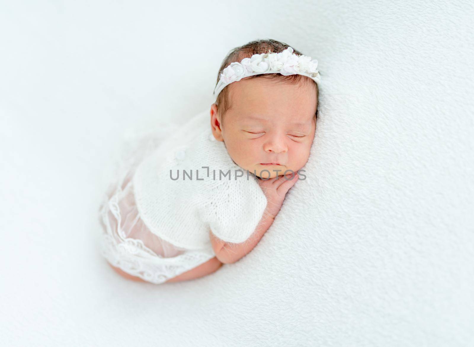 newborn baby girl sleeping sweetly