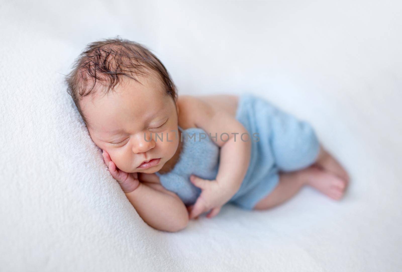 Cute sleeping newborn baby boy