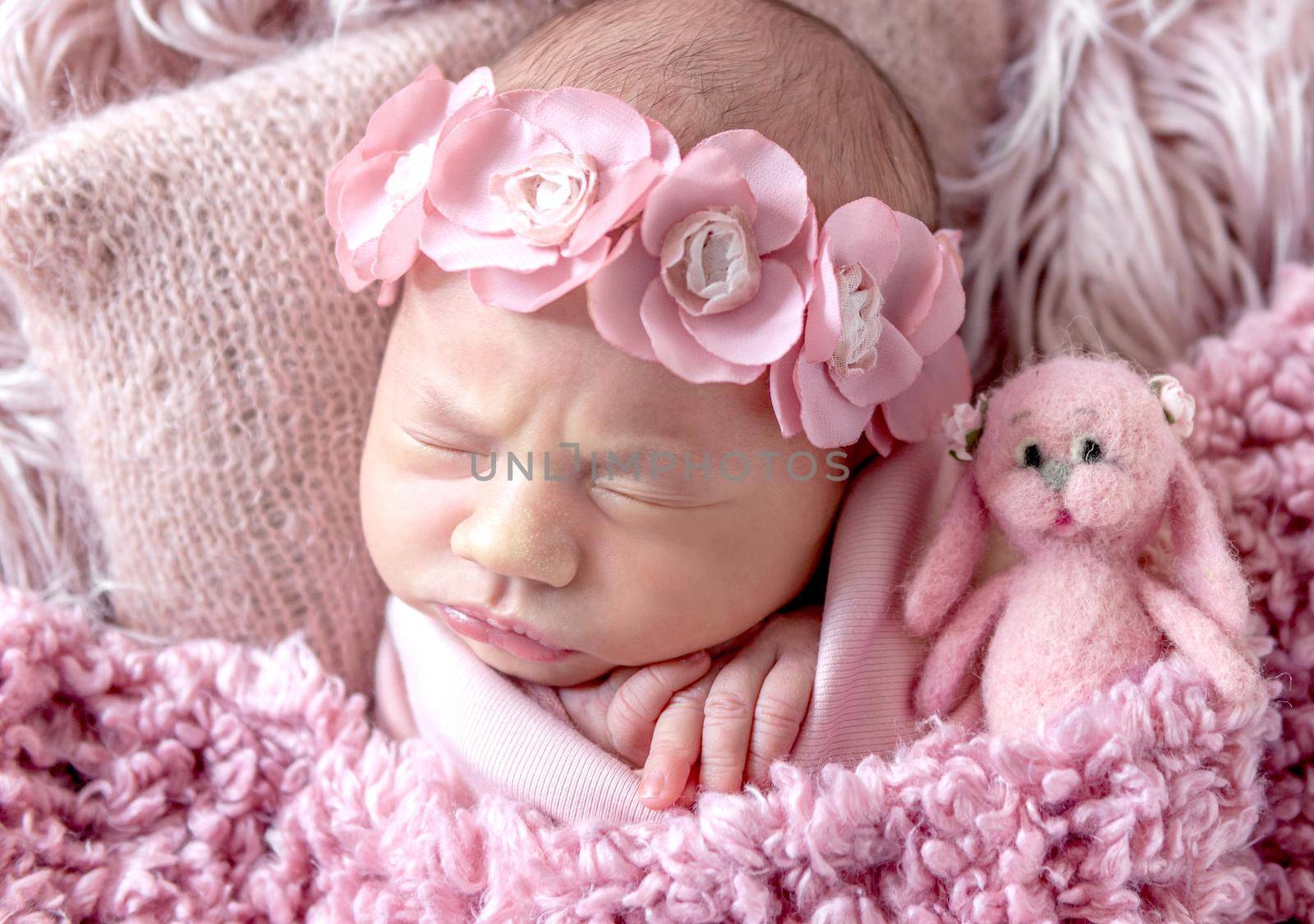 cute sleepy newborn baby girl