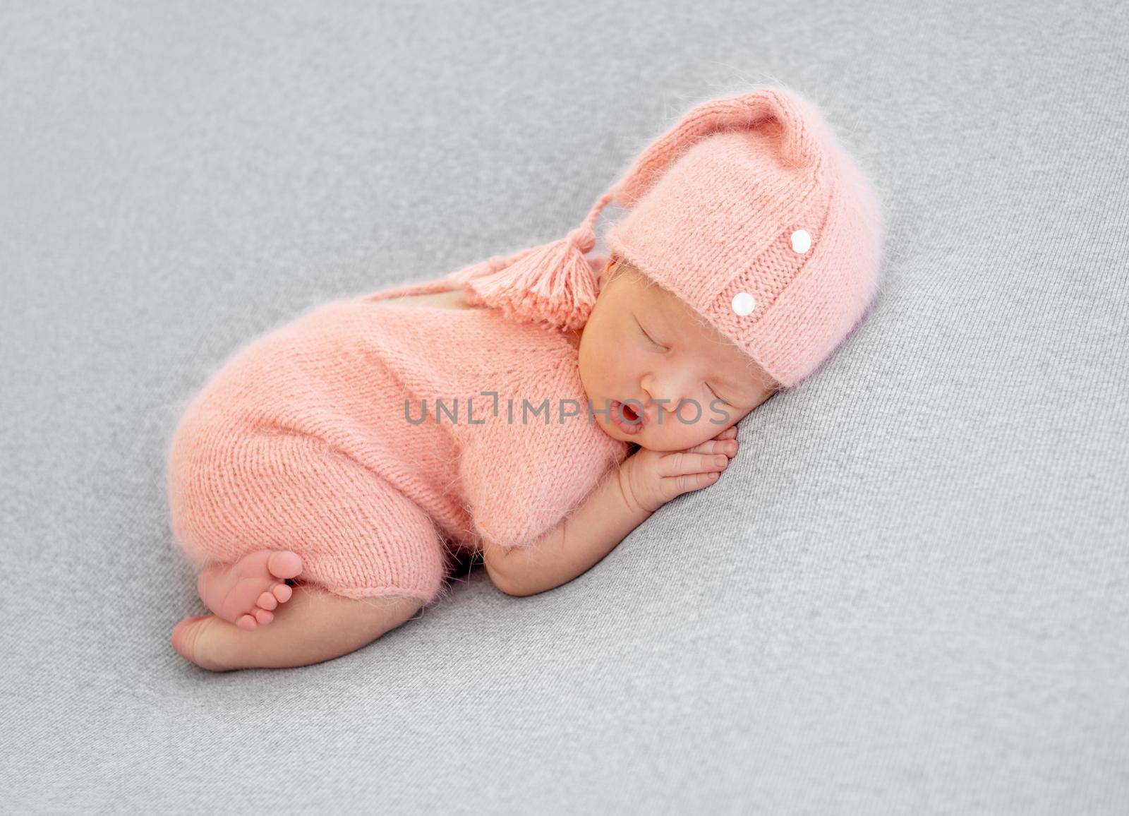 newborn baby girl sleeping sweetly