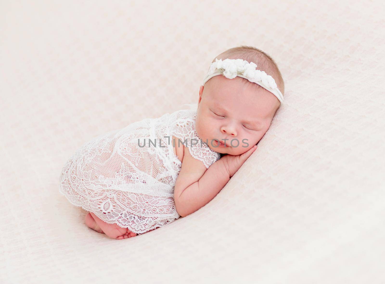 newborn baby girl sleeping sweetly