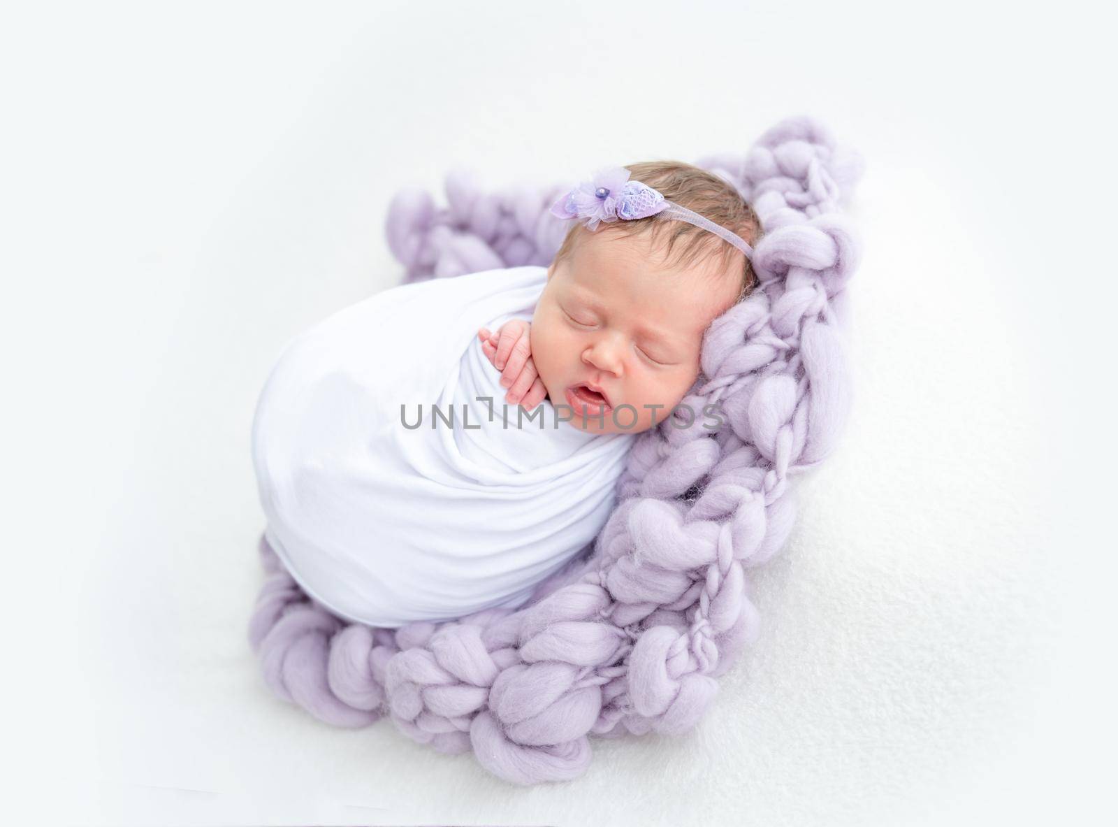 Charming newborn girl sleeping