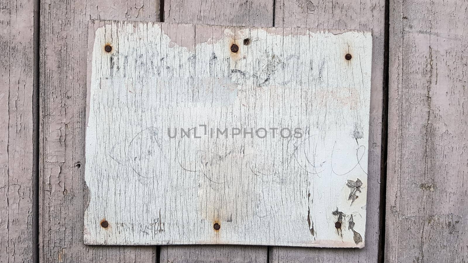 Sign boards on a rustic wooden wall mockup. vintage frames on an old wooden wall. Gray wooden background texture with copy space. wall wood table