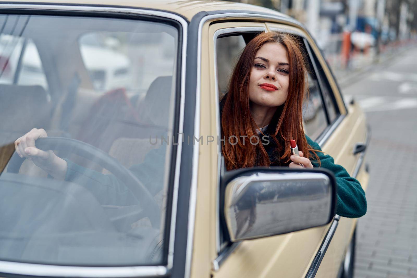 woman peeking out of car trip lifestyle fashion. High quality photo