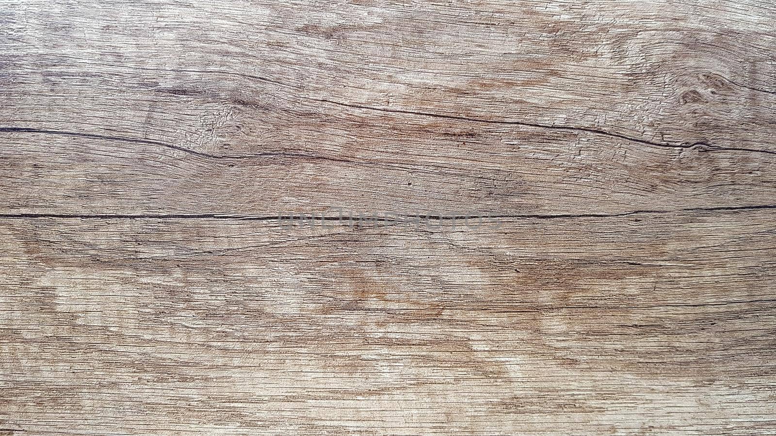 The surface is blurred by time, Old wooden background. weathered wood surface