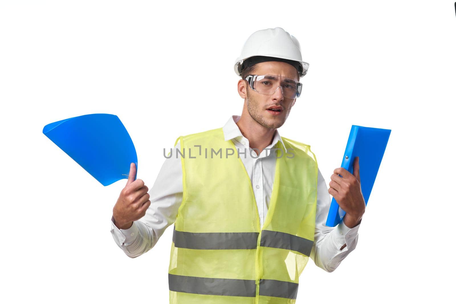 engineer in working uniform protective clothing documents construction. High quality photo