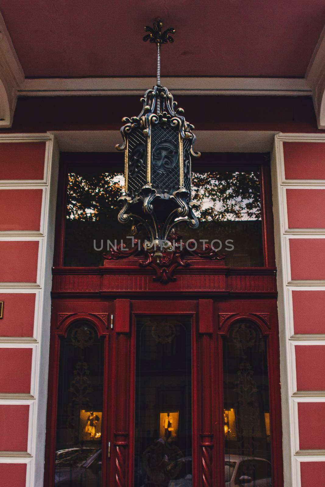 Old wooden weathered door in ancient town architecture
