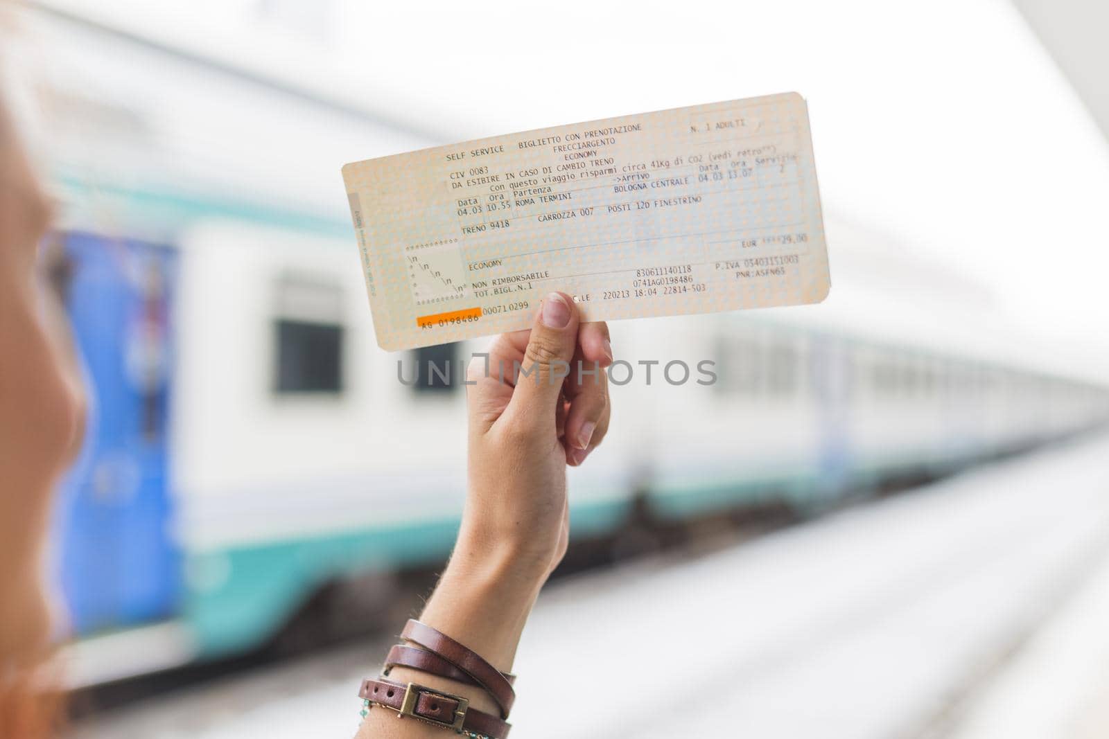 female tourist waiting train