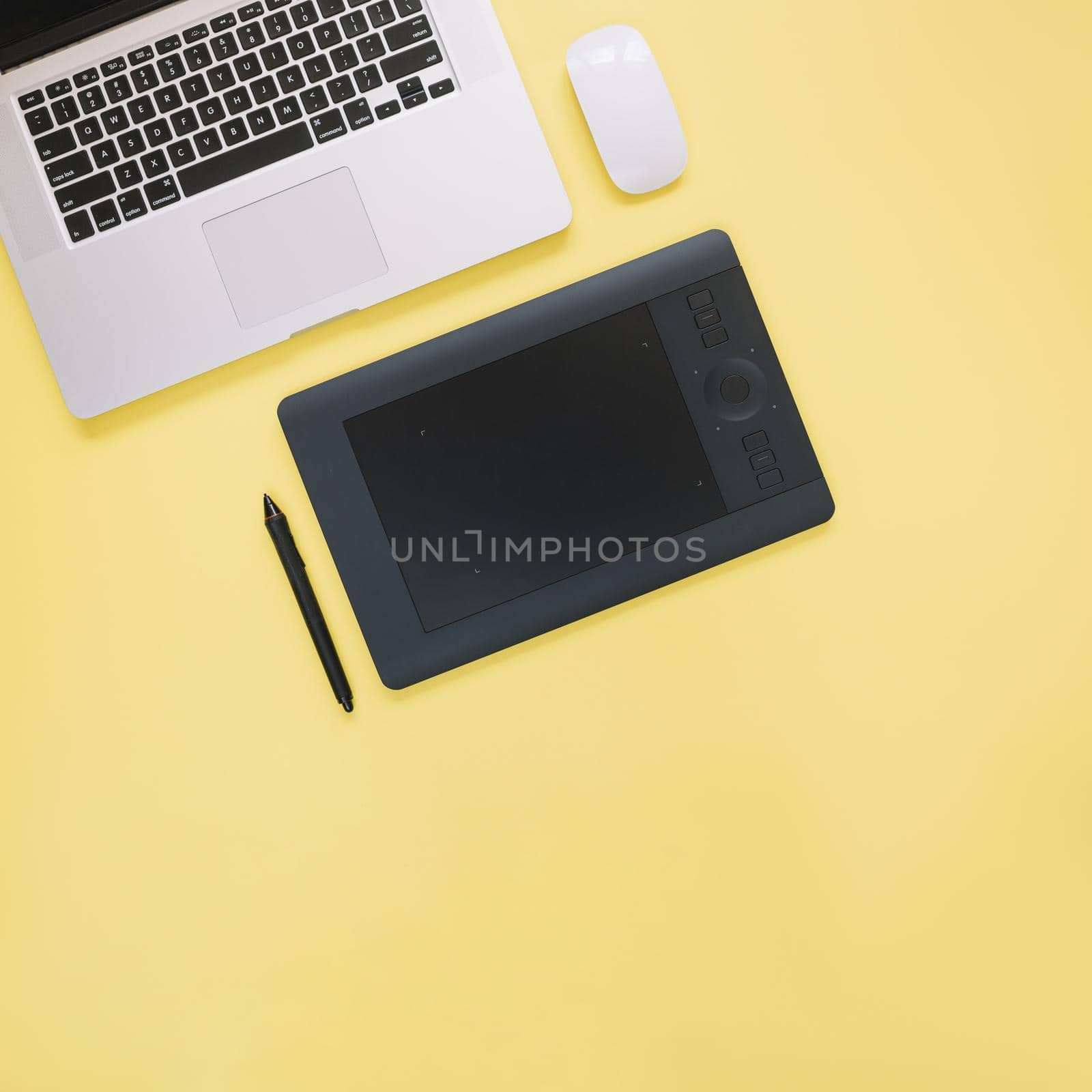 elevated view graphic digital tablet laptop yellow background by Zahard