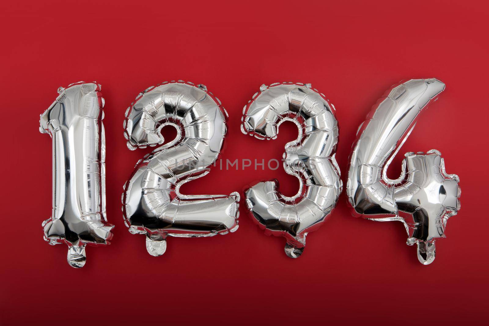 Silver number balloons on wine red background by Demkat