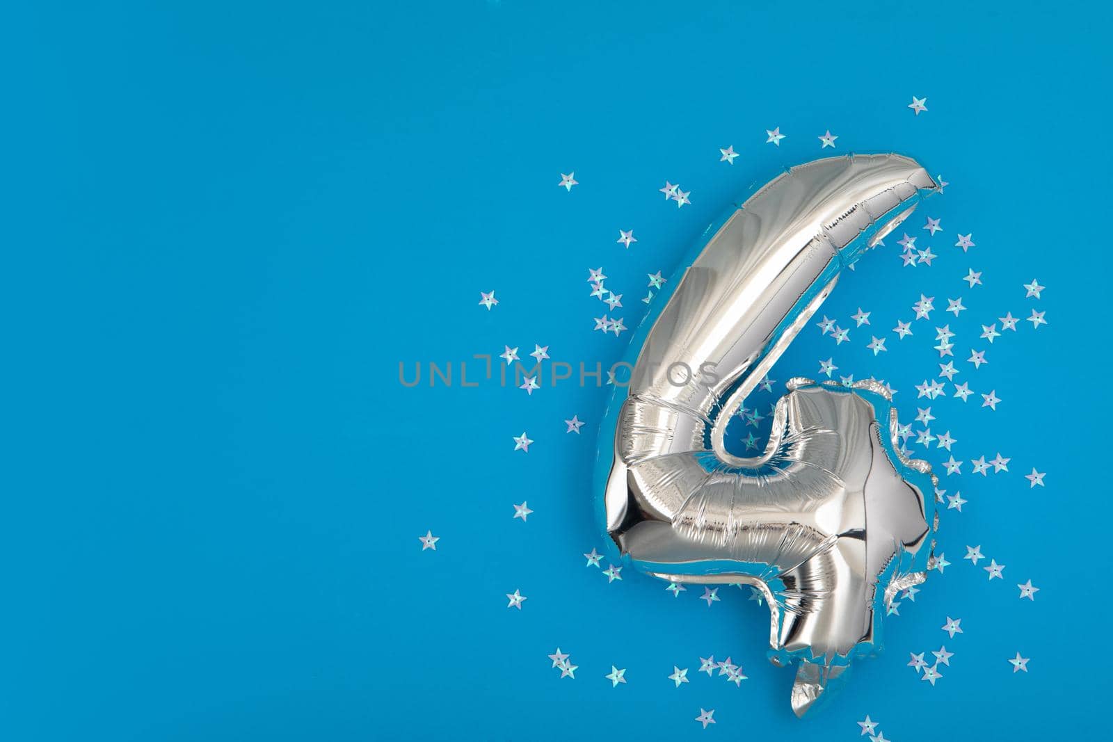 Silver balloon 4 on a blue background with confetti stars by Demkat