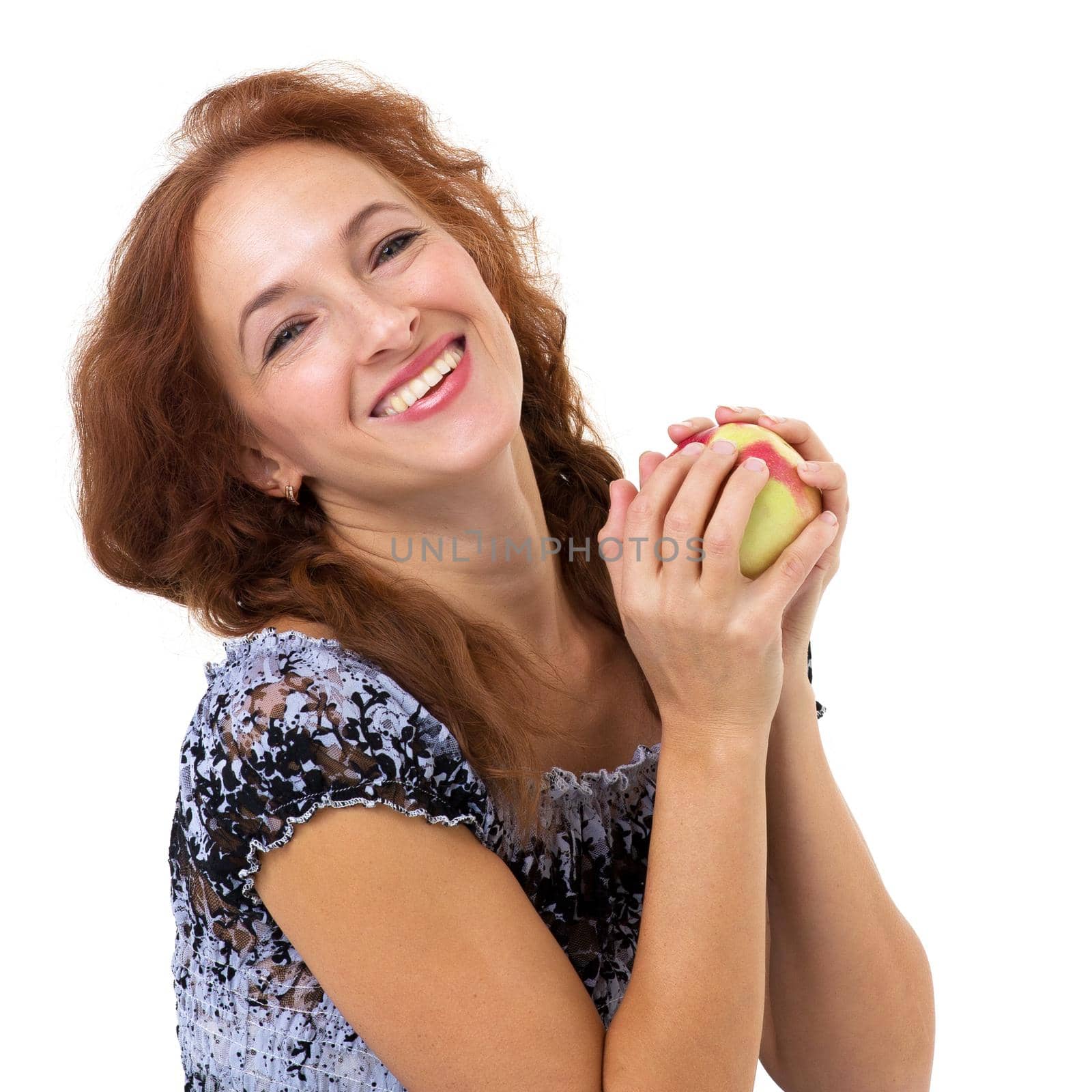 Happy woman holding fresh red apple. Portrait of cheerful girl smiling at camera on isolated white background with copy space. Healthy eating and diet concept
