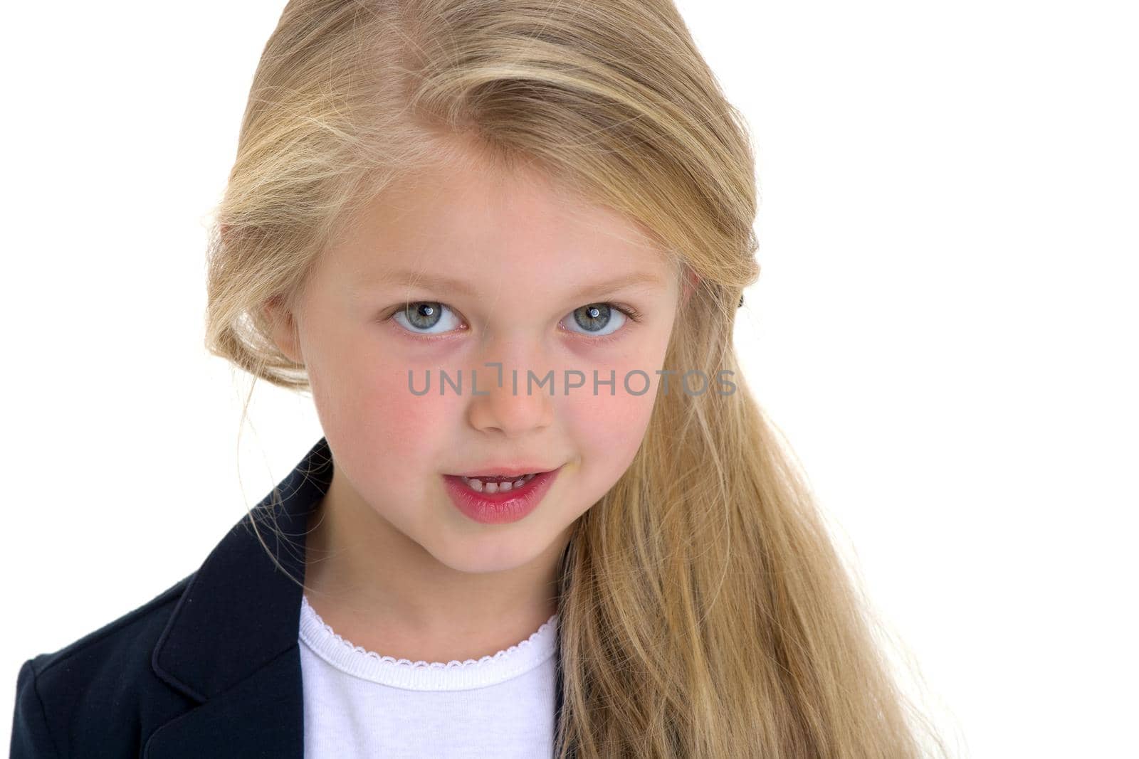 Front view portrait of beautiful little schoolgirl by kolesnikov_studio