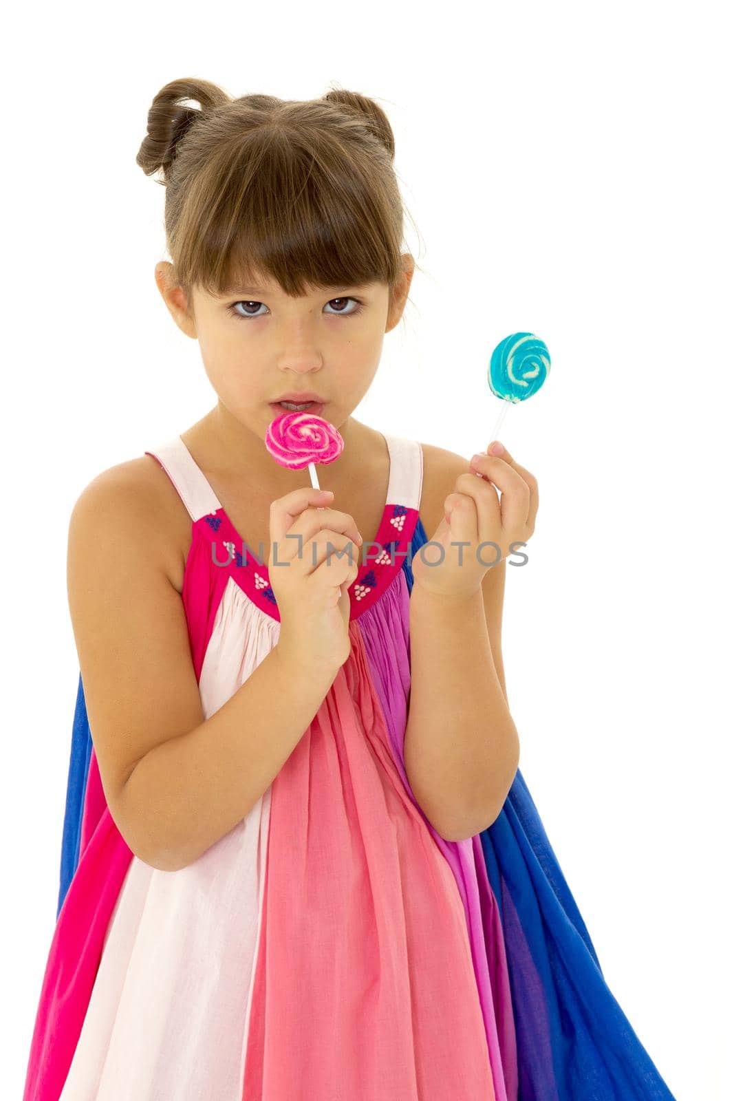 Pretty girl posing with lollipops by kolesnikov_studio