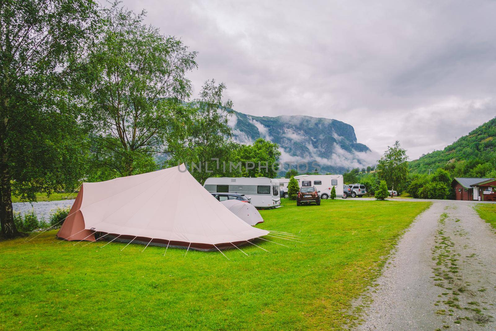 Traditional red camping houses in Lunde Camping, Norway July 21, 2019. Classical Norwegian Camping site with traditional wooden red cottages, Northern Norway. Camping cabins.