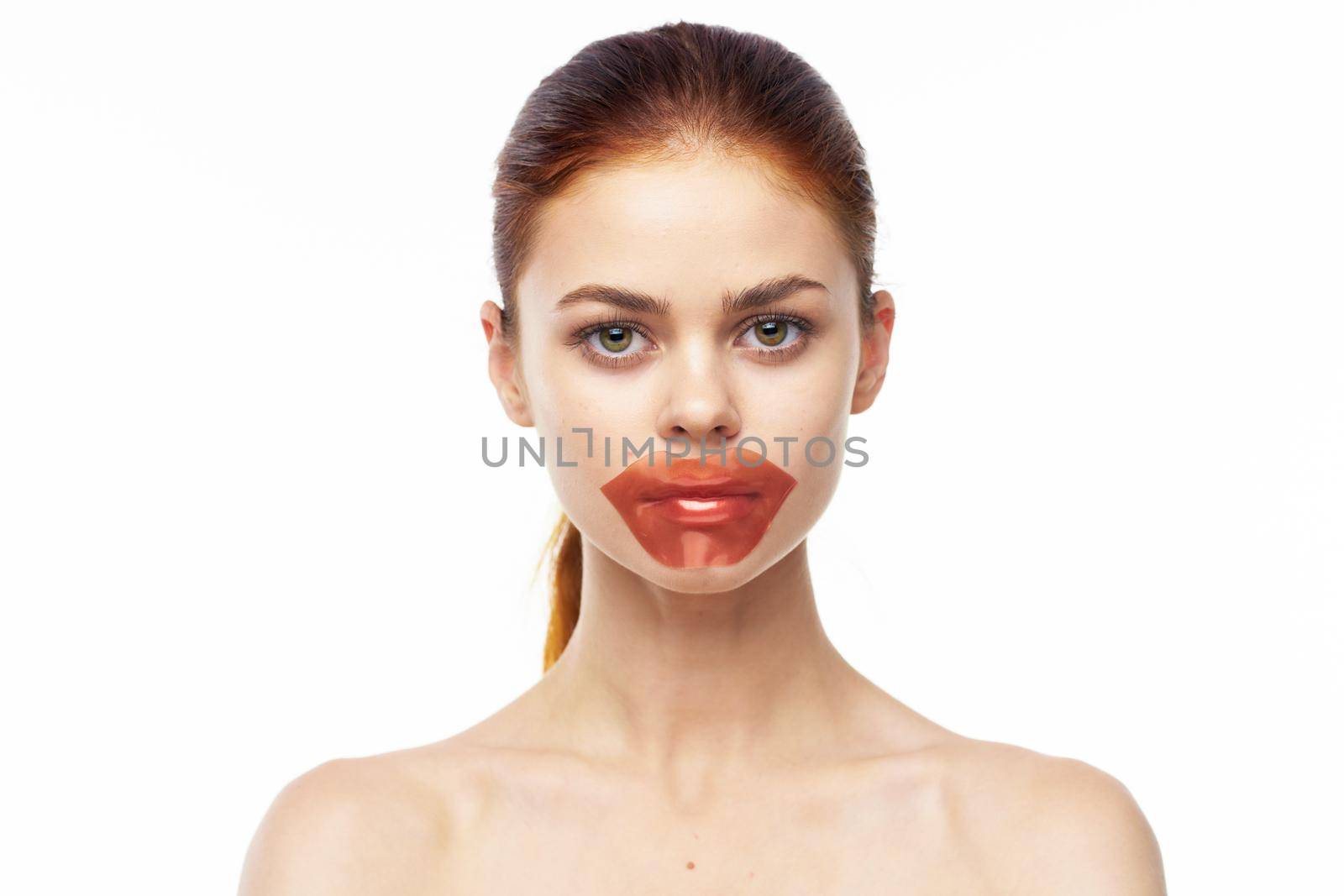 pretty woman in patches on face rejuvenation spa treatments. High quality photo