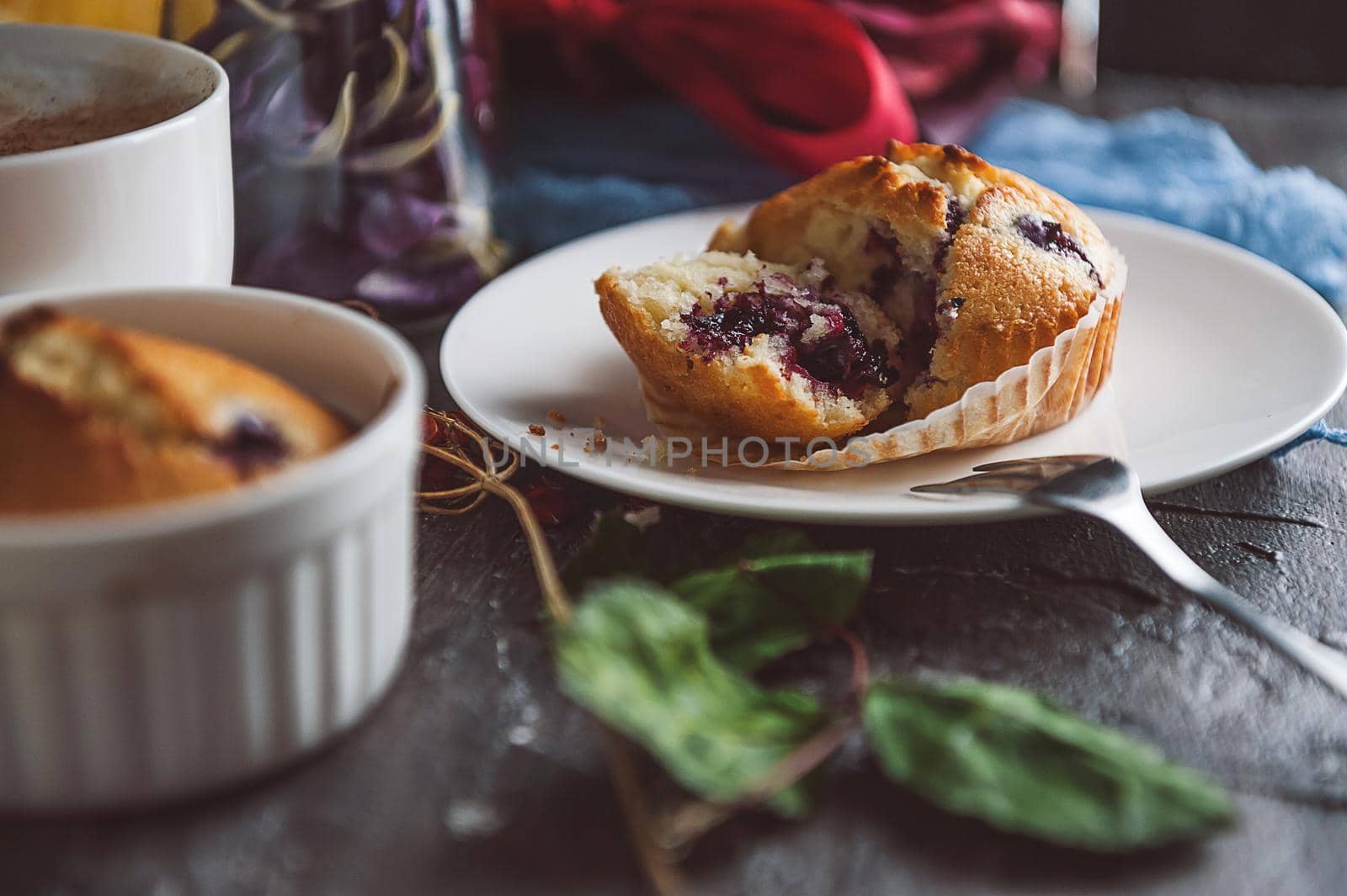 spring breakfast with muffins in rustic style