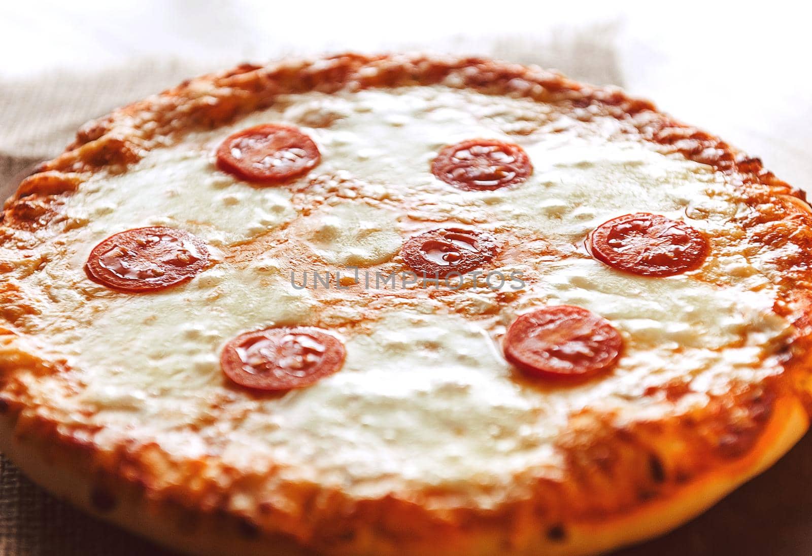 Hot Homemade Pepperoni Pizza Ready to Eat. natural light