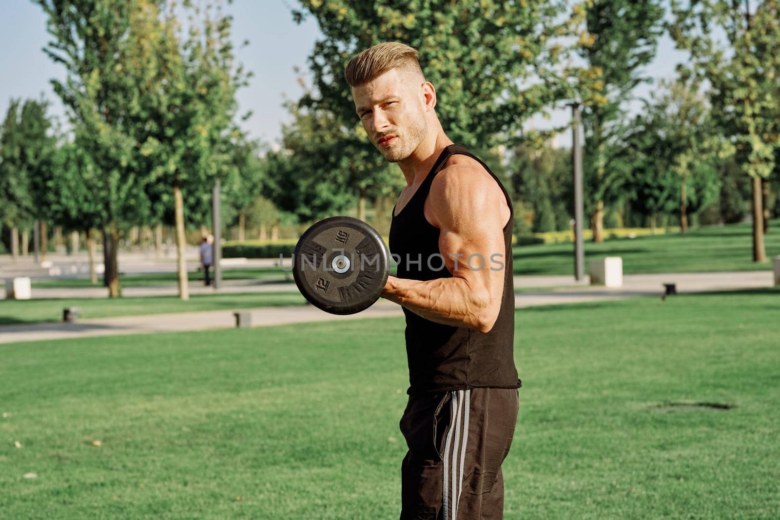 sports man parks workout fitness outdoors lifestyle. High quality photo