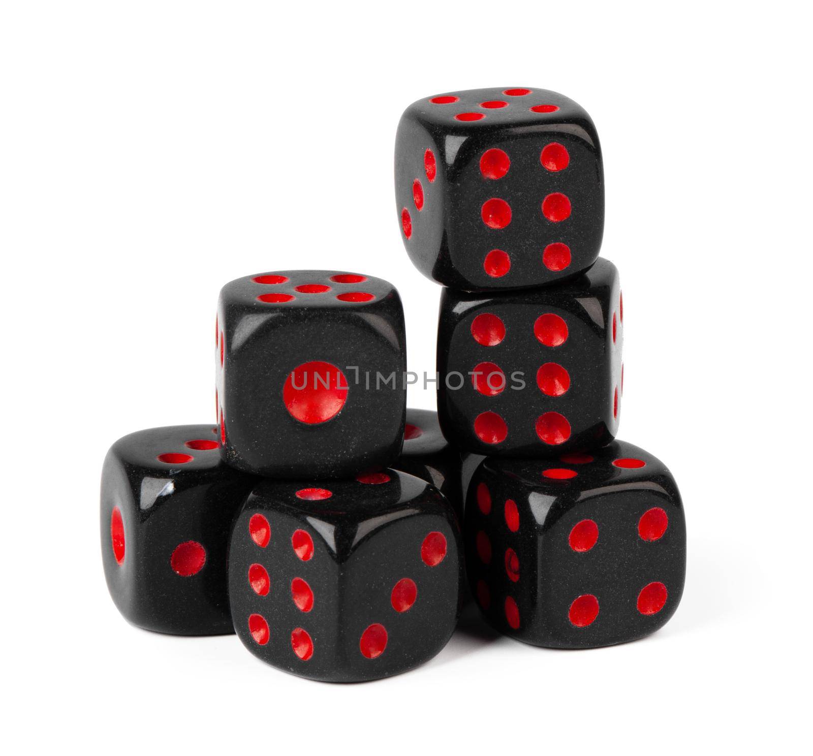 Stacked play dice isolated on white background. Close up.
