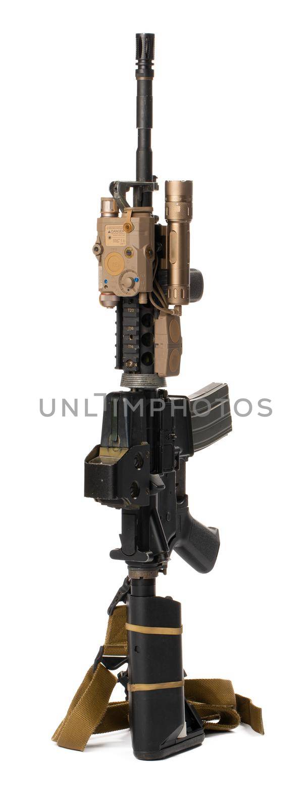 Military toy airsoft rifle isolated on white background. Close up.