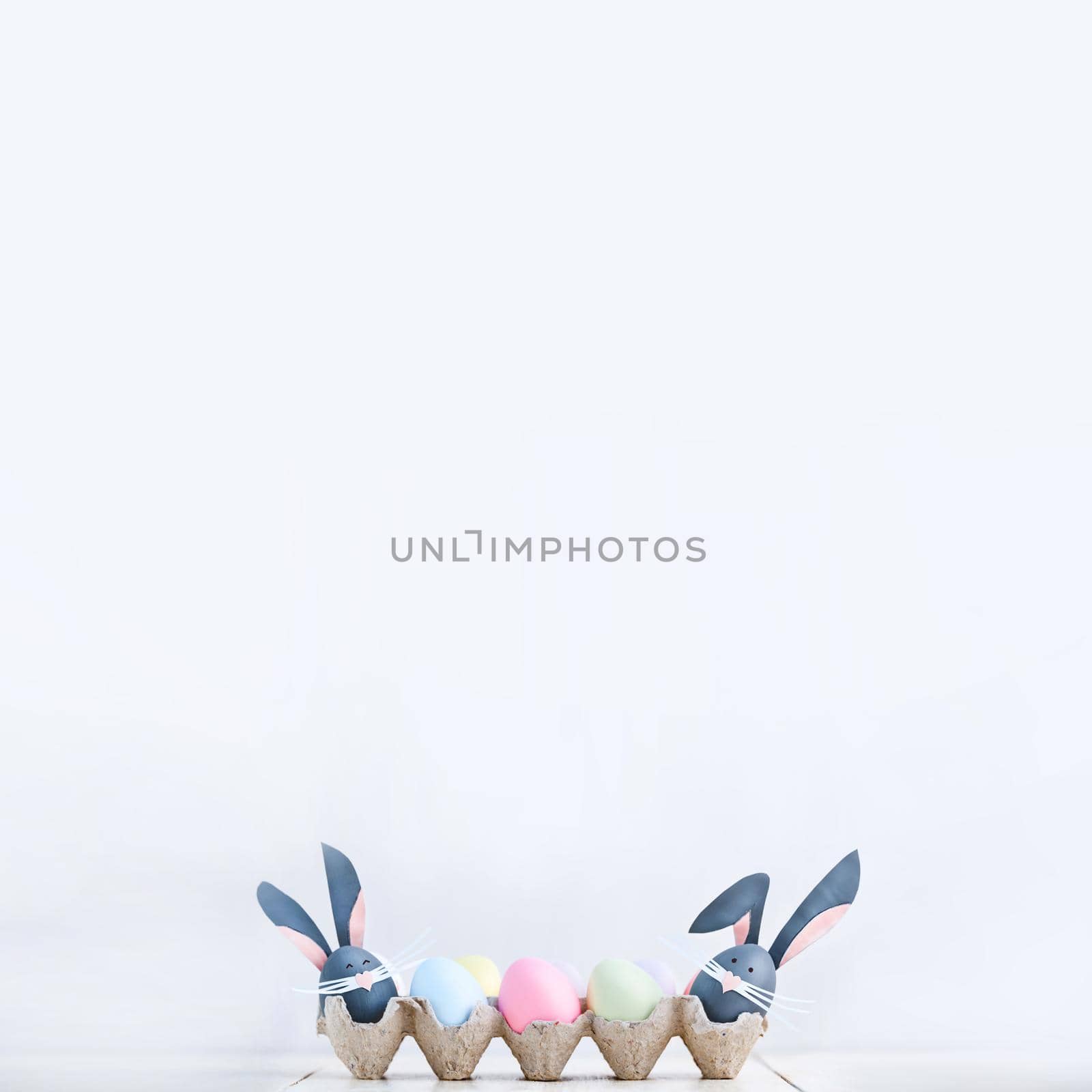 Cute creative photo with easter eggs, some eggs as the Easter Bunny by vvmich