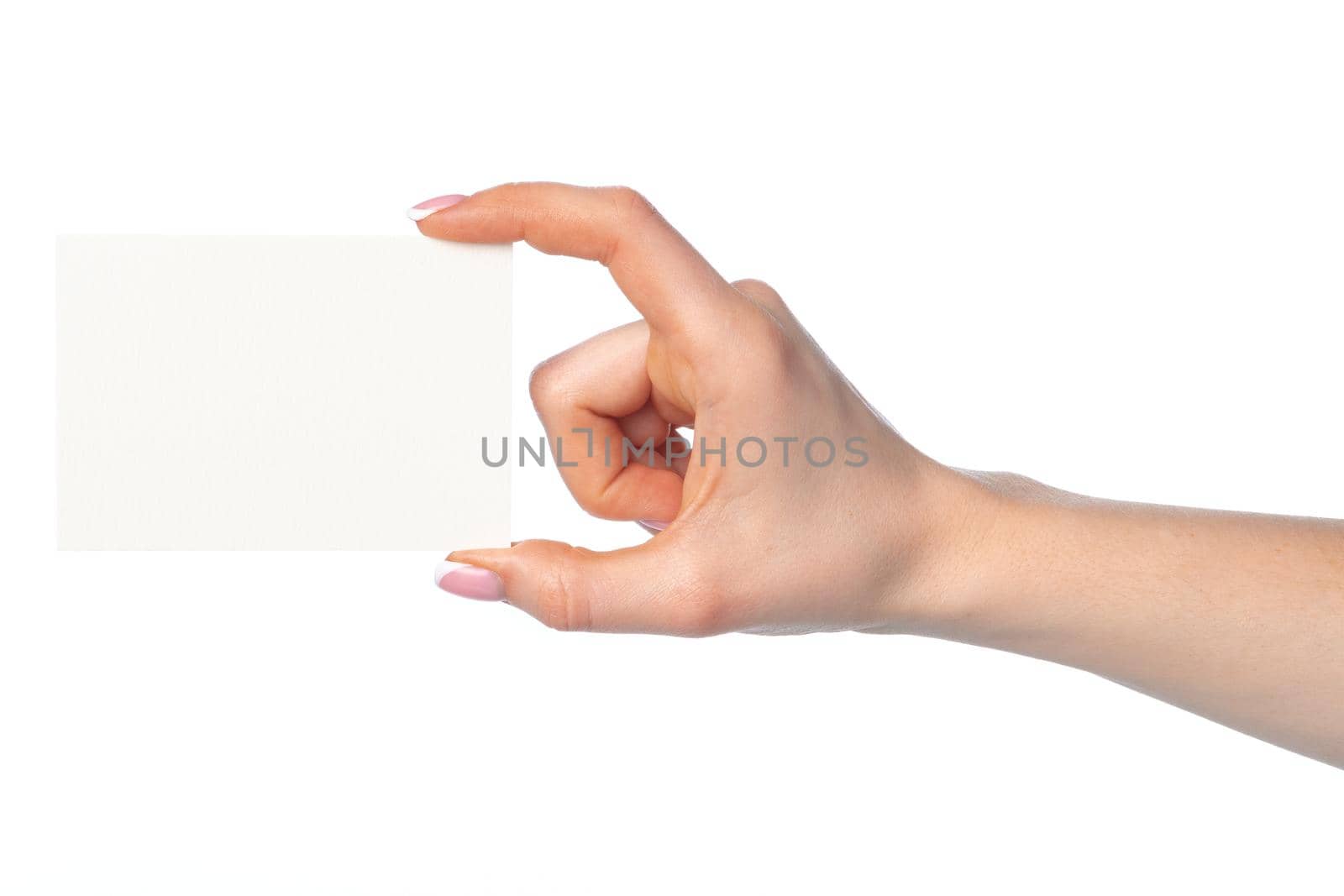 Woman's hand with blank white business card isolated on white background