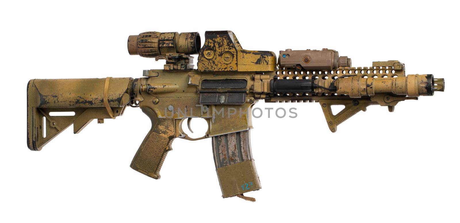 Military toy airsoft rifle isolated on white background. Close up.